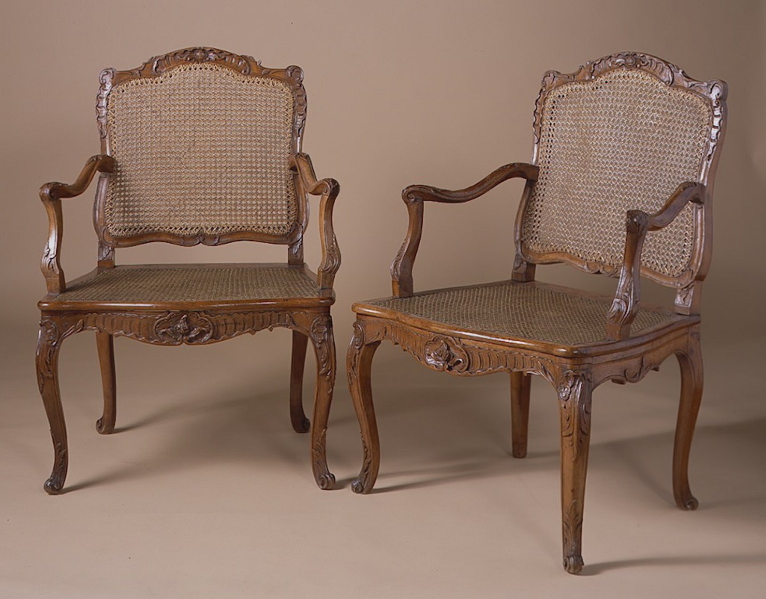Pair of French Louis XV Period, Beechwood Fauteuils with Cane Seats Stamped, “Cressonlaine”